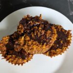 pumpkin muffins with chocolate drizzle on top