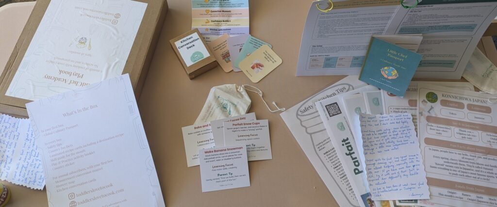 top view of contents of playbook, conversation cards and advent cards